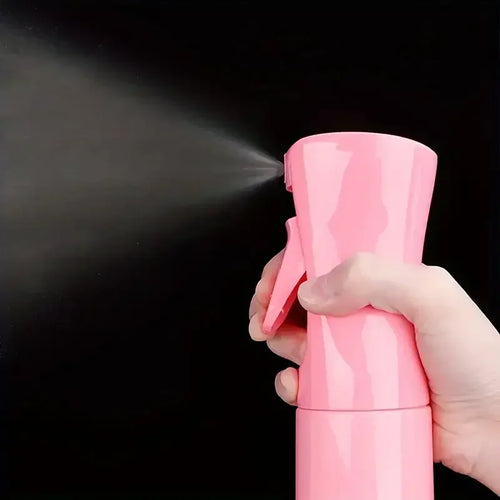 6‑piece hair brush and styling tool set including a spray bottle, hair braiding loop, rat tail comb, teasing brush, edge control brush and multi‑purpose hair brush. Perfect for salon‑style braiding, teasing, parting and edge styling at home or on the go.